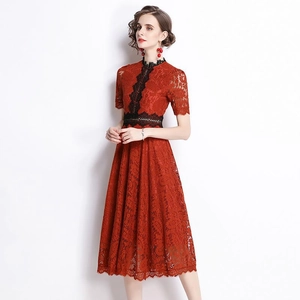 Elegant red floral lace midi dress with black lace trim in a sophisticated A-line silhouette