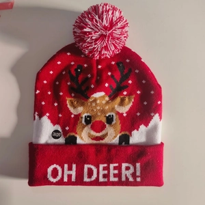 Red Christmas LED beanie with reindeer pattern and Oh Deer text on white background