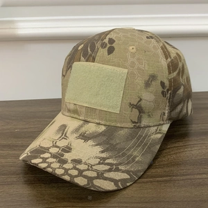 Detail of tactical camo baseball cap with ripstop fabric and front loop patch area