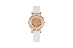 Detailed macro of rose gold watch face with floating rhinestones and white leather strap