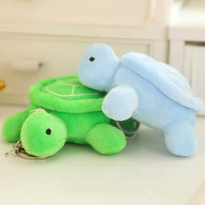 Cute luminous plush sea turtle keychains in bright green and sky blue colors