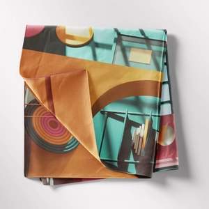 Detail of bohemian tapestry with abstract geometric art print and smooth fabric texture