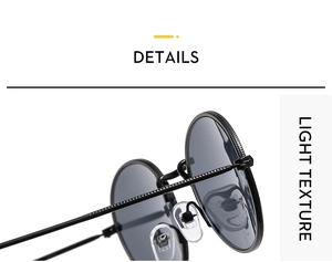 Detail of vintage oval metal sunglasses with textured frame and silicone nose pads