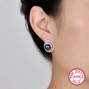 Elegant S925 sterling silver stud earrings featuring dark pearls and cubic zirconia