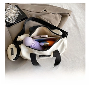 Detail view of the spacious nylon boston bag interior showing high storage capacity