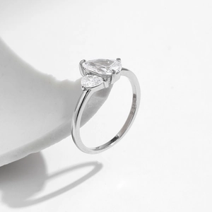 Elegant S925 sterling silver ring with three sparkling teardrop zircon stones on white base