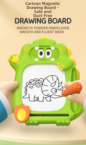 Detail of green dinosaur magnetic drawing board with stylus and reusable writing surface