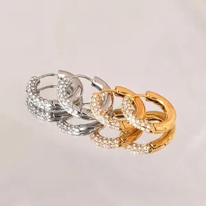 Chic 18K gold and silver huggie hoop earrings with micro-paved cubic zirconia crystals