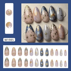 Fantasy moon and star press-on nails with blue and purple marble wave patterns