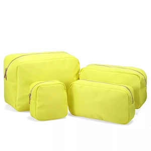 Lot de 4 trousses de maquillage en nylon jaune, imperméables et de tailles variées