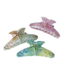 Starfish acetate hair claw with rhinestones in gradient pink, white and blue-green colors