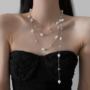 Long multi-layer irregular pearl necklace with silver chain for elegant styling