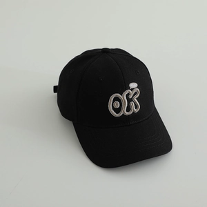 Detail of a black cotton baseball cap featuring high-quality OK letter embroidery