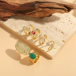 French vintage style open rings in gold finish with red and green oval gemstones