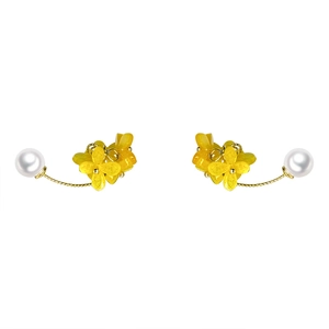 Elegant gold earrings featuring yellow osmanthus flower clusters and white pearls on white background