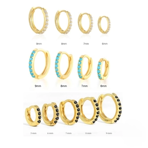 Detail of 5-9mm gold zircon hoop earrings set featuring white, blue and black stones
