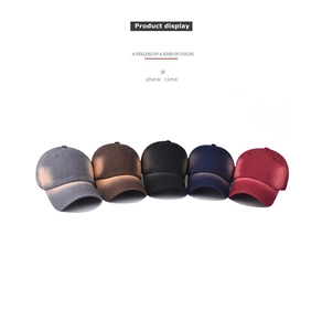 Row of washed denim baseball caps in five classic colors shown on a clean white background