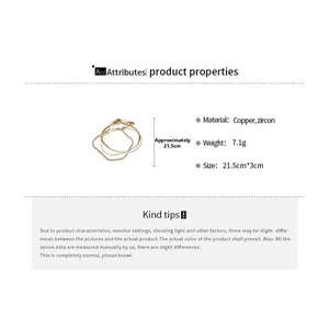 Detail view of gold layered zircon bracelet with copper material specs and 21.5cm sizing