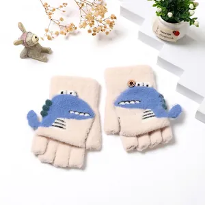 Cozy knitted winter gloves for children featuring a 3D blue cartoon dinosaur design