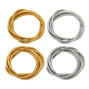 Set of multi-layer stainless steel spring bracelets in 18K gold and silver finishes