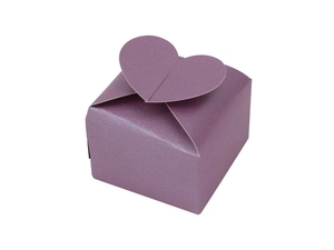 Detail view of a purple pearlescent paper candy box with a heart-shaped top closure