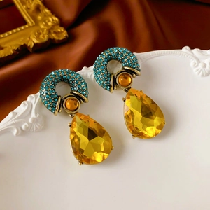 Vintage palace style earrings with amber round gems and yellow teardrop crystals