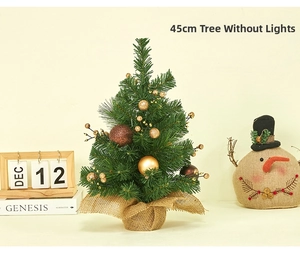 45cm small tabletop Christmas tree with burlap base and gold ornaments on a warm desk