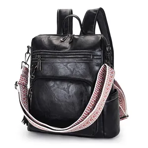 Vintage black leather backpack with colorful geometric wide strap and multi-pocket design