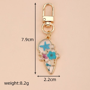 Detailed view of dried flower ice cream keychain with size and weight dimensions
