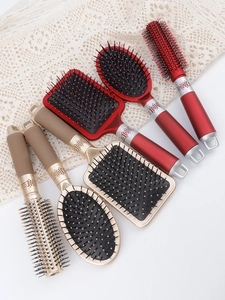 Close-up of a 3-piece bamboo hairbrush set with massage air cushions and ergonomic handles