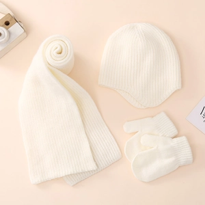 Winter warm knitted set for baby including earflap hat scarf and gloves in cream white