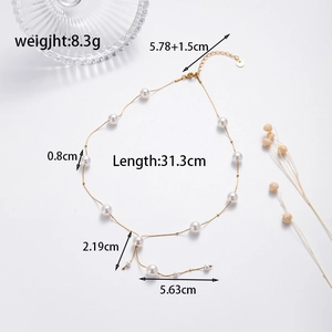 Elegant gold titanium necklace with white pearls and tassels, total length 31.3cm, weight 8.3g