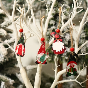 Set of 4 festive wooden forest gnome ornaments with red beads on a white tree branch