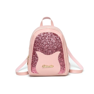 Mini light pink sequined fashion backpack for women featuring shiny glitter and gold zippers