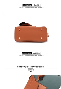 Detail view of the bag bottom with four gold metal rivets and a textured leather finish