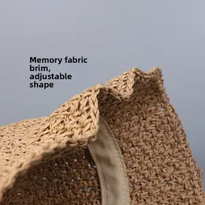 Detail of woven straw hat featuring memory wire brim for flexible shape and easy styling