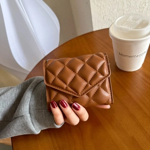 Chic brown quilted leather compact wallet for women featuring a stylish envelope fold design
