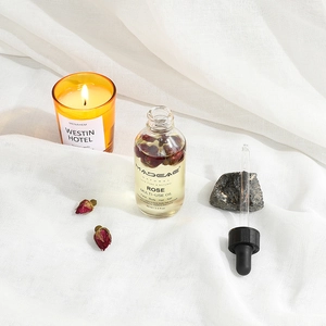 Natural 60ml rose multi-use oil bottle with real flower petals for face and body care