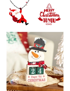 Close-up of snowman wooden countdown calendar with red plaid scarf on a rustic tray