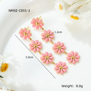 Detail of pink daisy earrings with dimensions 5.9cm length and 1.2cm flower diameter