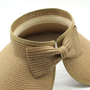 Foldable straw sun visor hat with bow decoration and wide brim for UV protection