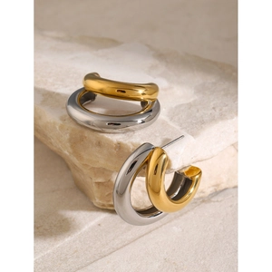 Interlocking geometric two-tone C-shape earrings in gold and silver stainless steel