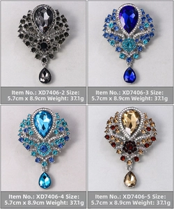 Detailed view of luxury crystal brooches in four colors for wedding bouquet or suit