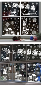 Detailed Christmas window decals showing Santa's sleigh, snowflakes and Merry Christmas text