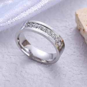 Polished silver titanium steel ring with sparkling zircon stones in a sleek channel setting