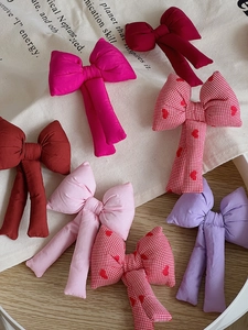 Assortimento di fermagli per capelli con fiocchi in tessuto colorato fatti a mano con nastri