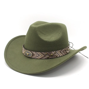 Close-up of western fedora with bull head badge and metal studded woven band