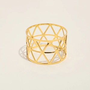 Modern gold metal napkin ring featuring an elegant hollow geometric triangle mesh pattern