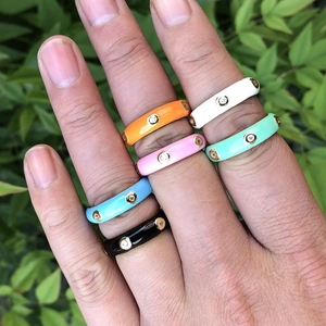 Set of 6 colorful enamel rings for women with AAA zircon stones on hand outdoors