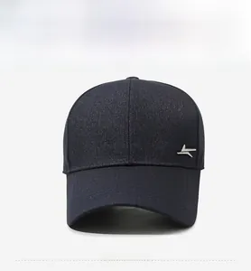 Front view of a navy blue baseball cap with fine twill texture and silver metal logo